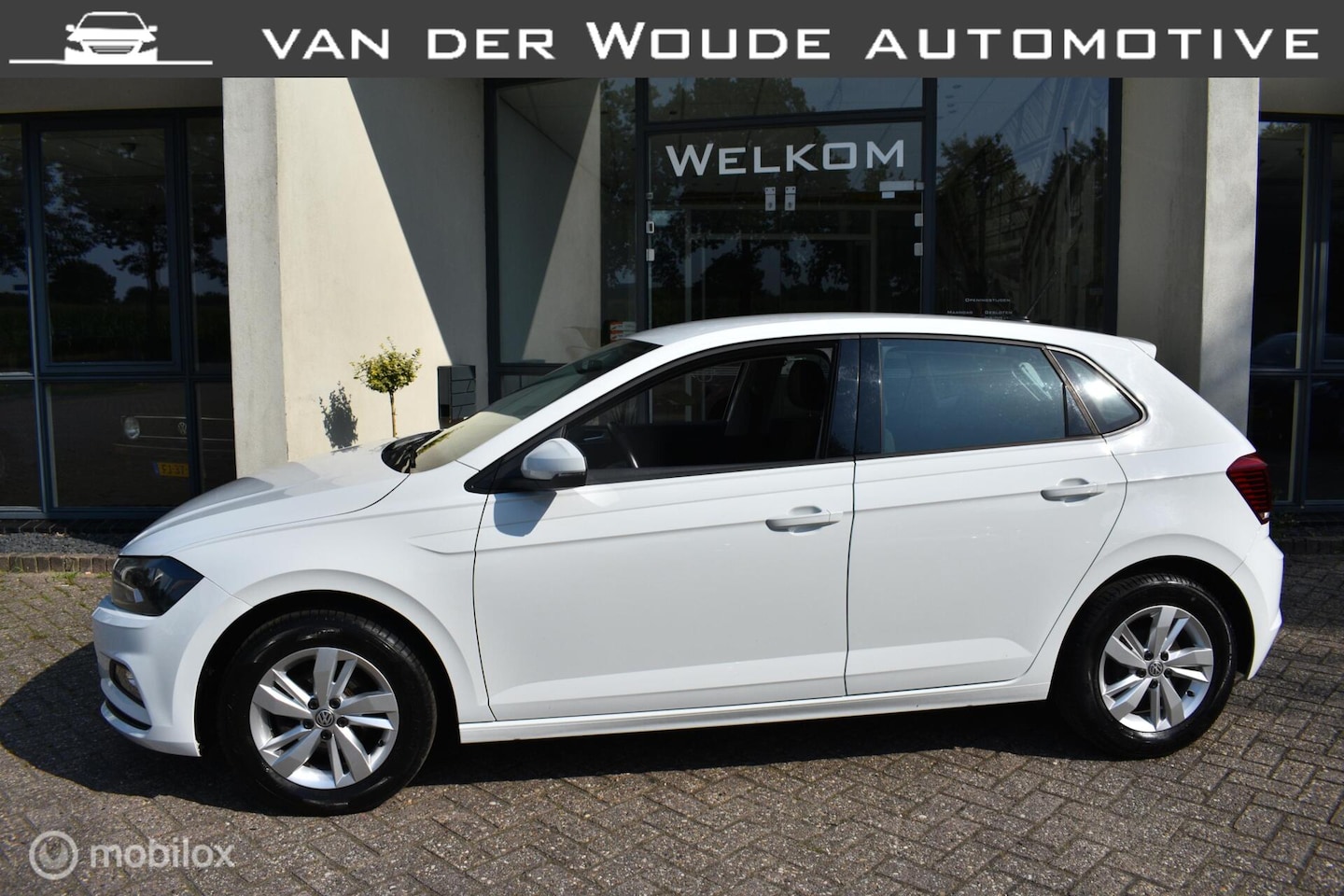 Volkswagen Polo - 1.0 TSI Comfortline 1.0 TSI Comfortline 5DRS, Airco|Navi|Carplay - AutoWereld.nl