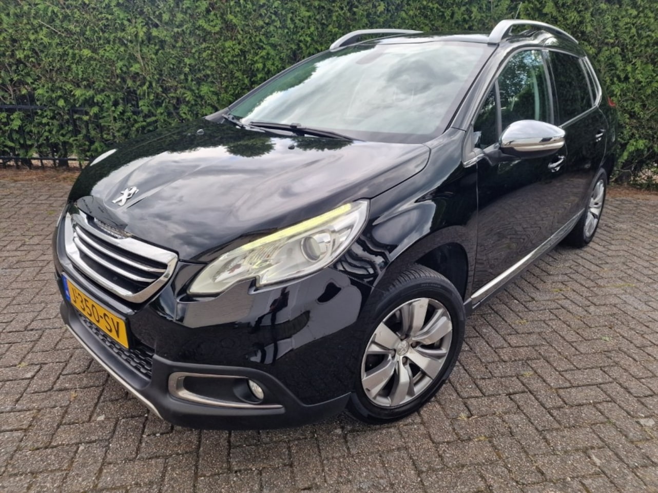 Peugeot 2008 - 1.6 Vti Allure: Pano, half leder nieuwe ketting - AutoWereld.nl