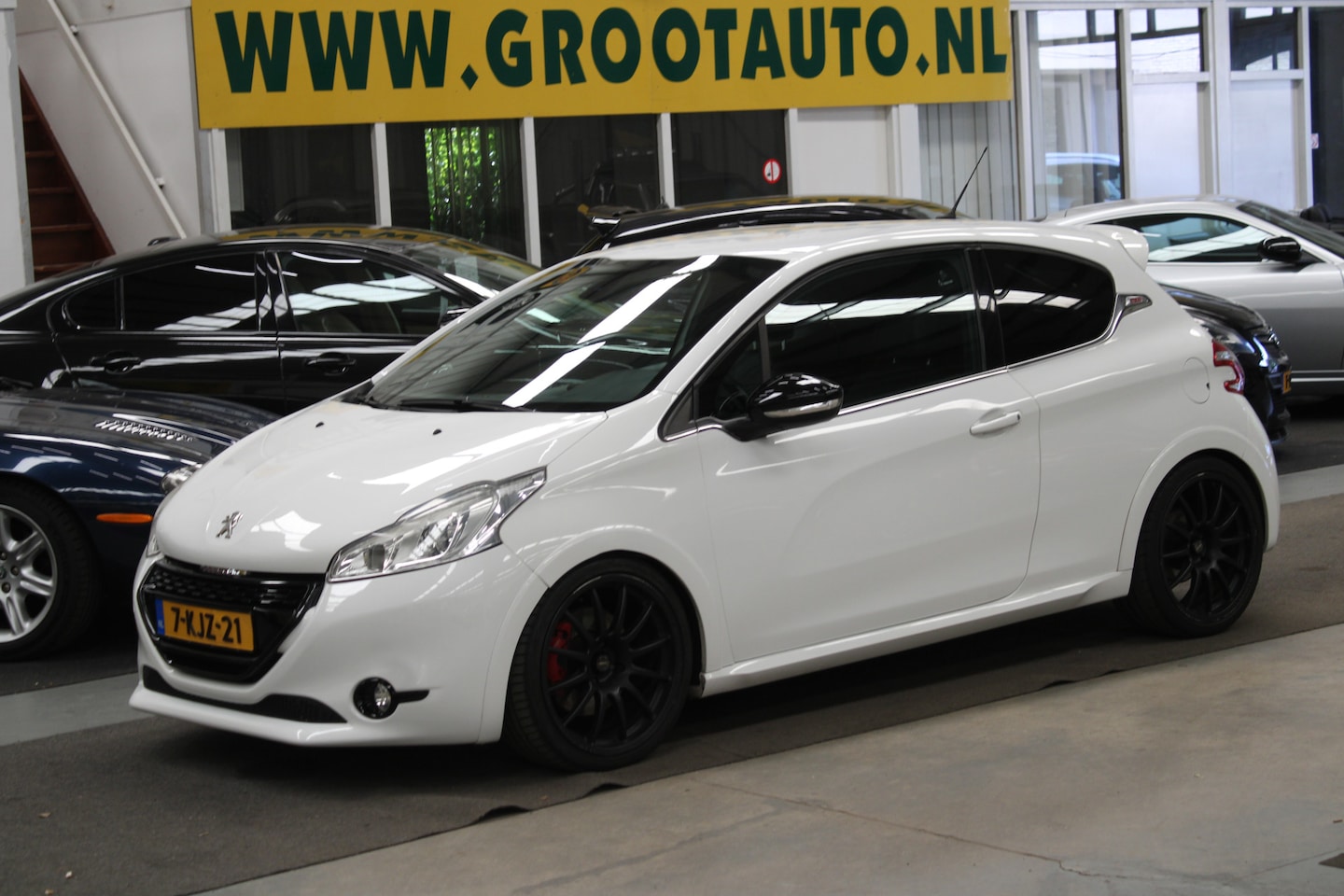Peugeot 208 - 1.6 THP GTi NAP, Airco, Cruise control, Navi, Sport interieur - AutoWereld.nl