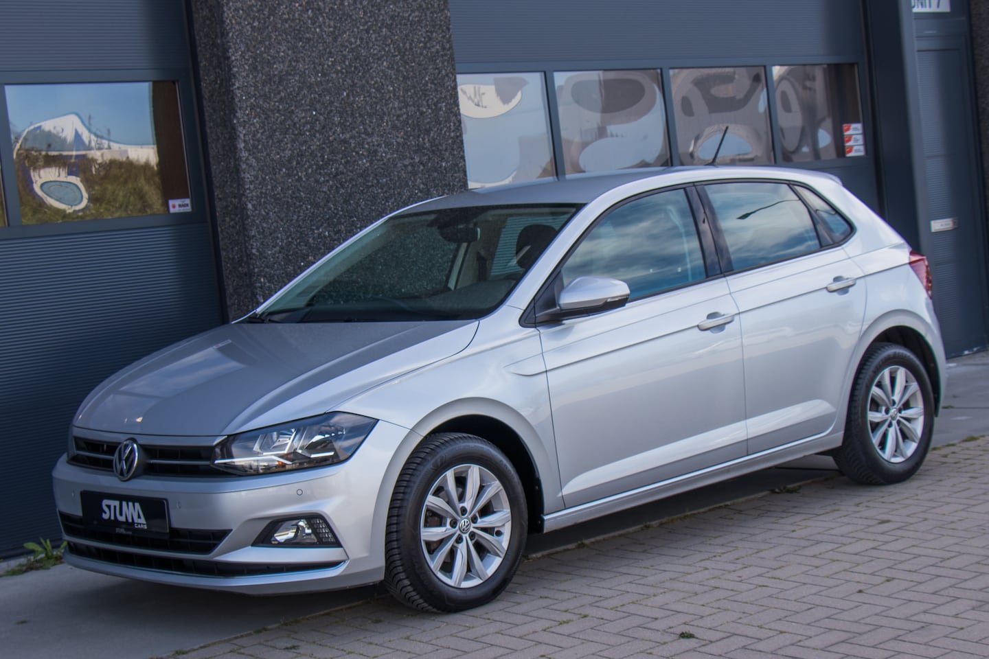 Volkswagen Polo - 1.0 TSI Highline | Navi | Climate | Stuurbediening | Stoelverwarming | Sfeer | Carplay Voo - AutoWereld.nl