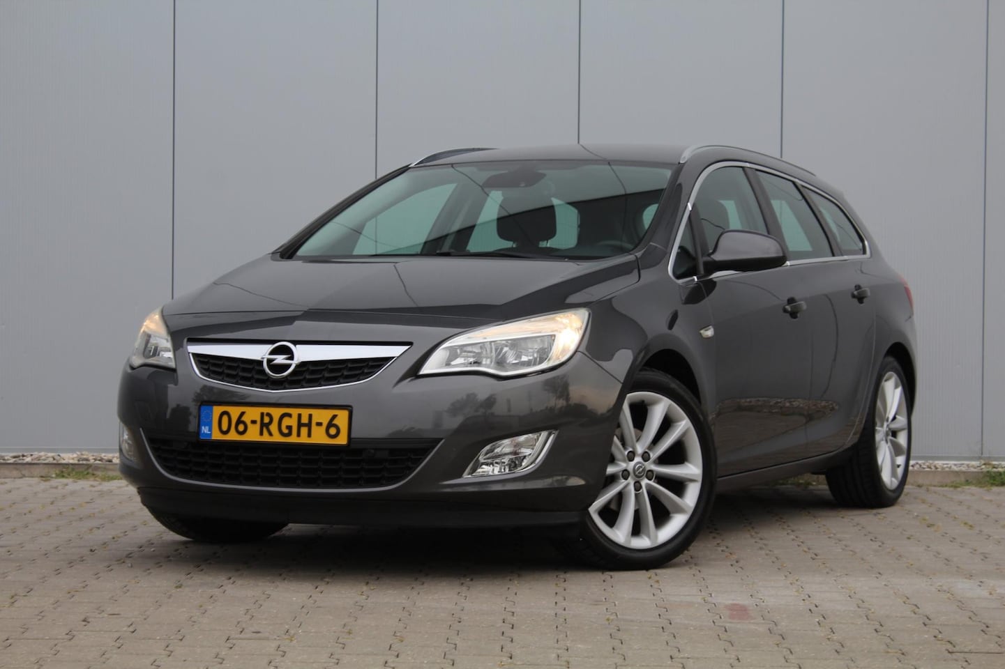 Opel Astra Sports Tourer - 1.4 Turbo Cosmo | Trekhaak | Clima / Cruise control | Stoel / Stuurverwarming | NAP | APK - AutoWereld.nl