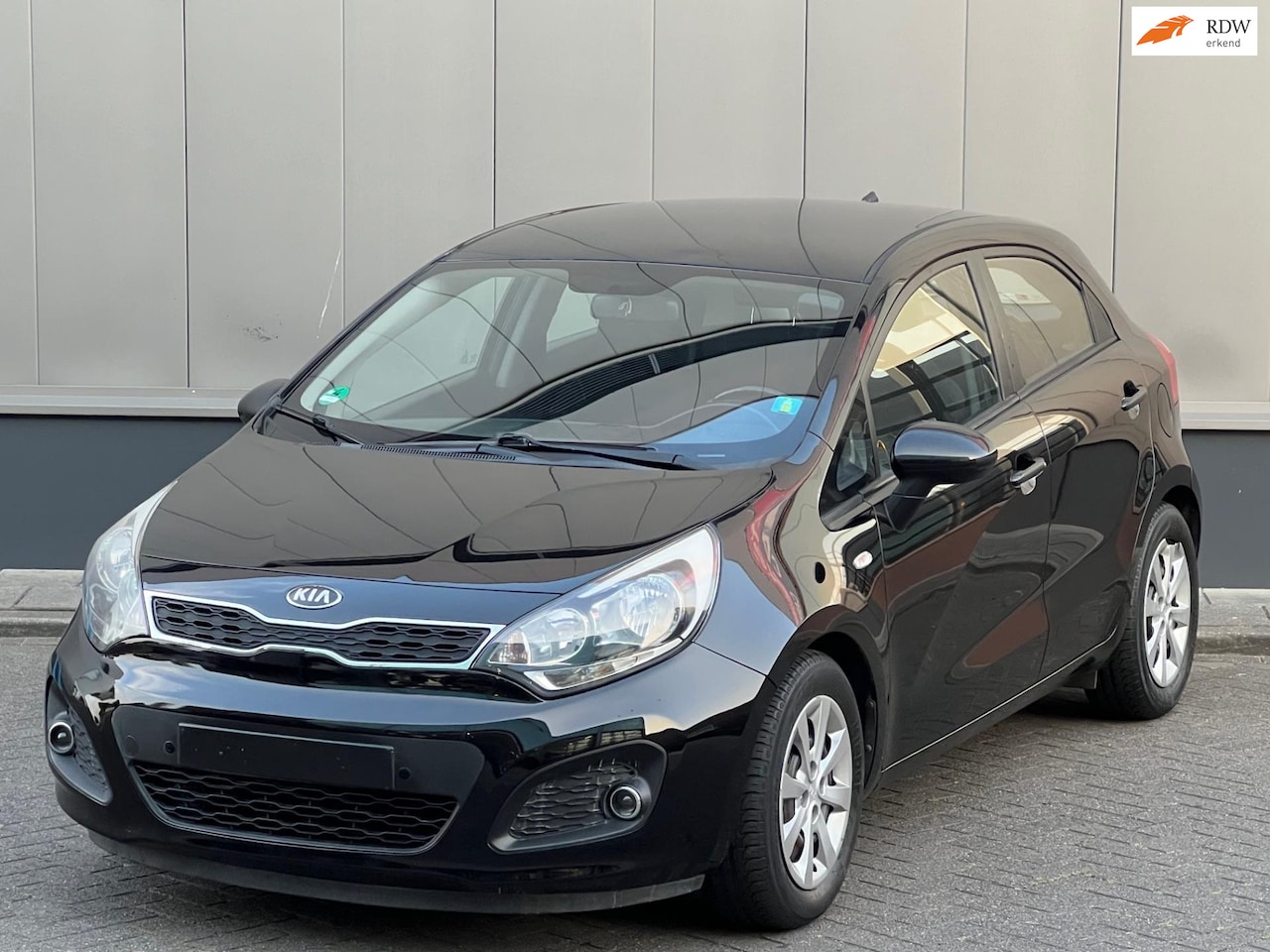 Kia Rio - 1.2 CVVT World Cup Edition 1.2 CVVT World Cup Edition - AutoWereld.nl