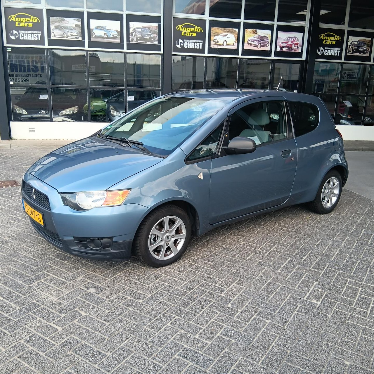 Mitsubishi Colt - 1.1 Inbusiness 1.1 Inbusiness - AutoWereld.nl
