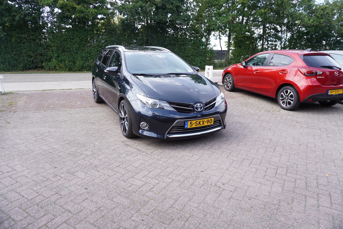 Toyota Auris Touring Sports - 1.8 Hybrid Lease Pro PANORAMADAK CAMERA NAVI - AutoWereld.nl