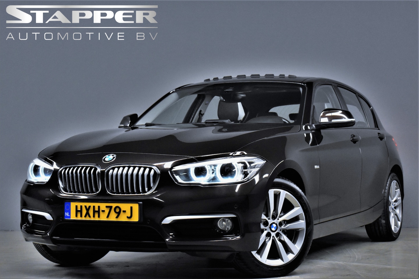 BMW 1-serie - 118i 136pk Pano/Navi/Led/H.leer/Stoelverw./Pdc/Lmv - AutoWereld.nl