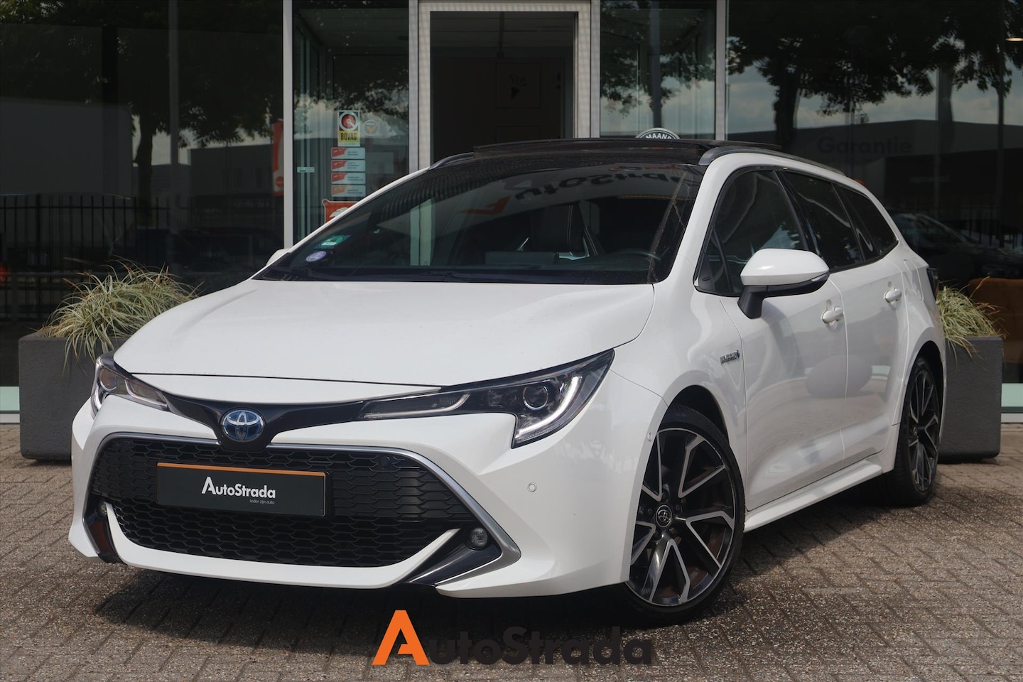 Toyota Corolla Touring Sports - 2.0 GR Hybrid 184pk | Camera | JBL | ACC | Navi | Climate | Dodehoek | Head-Up | Keyless | - AutoWereld.nl