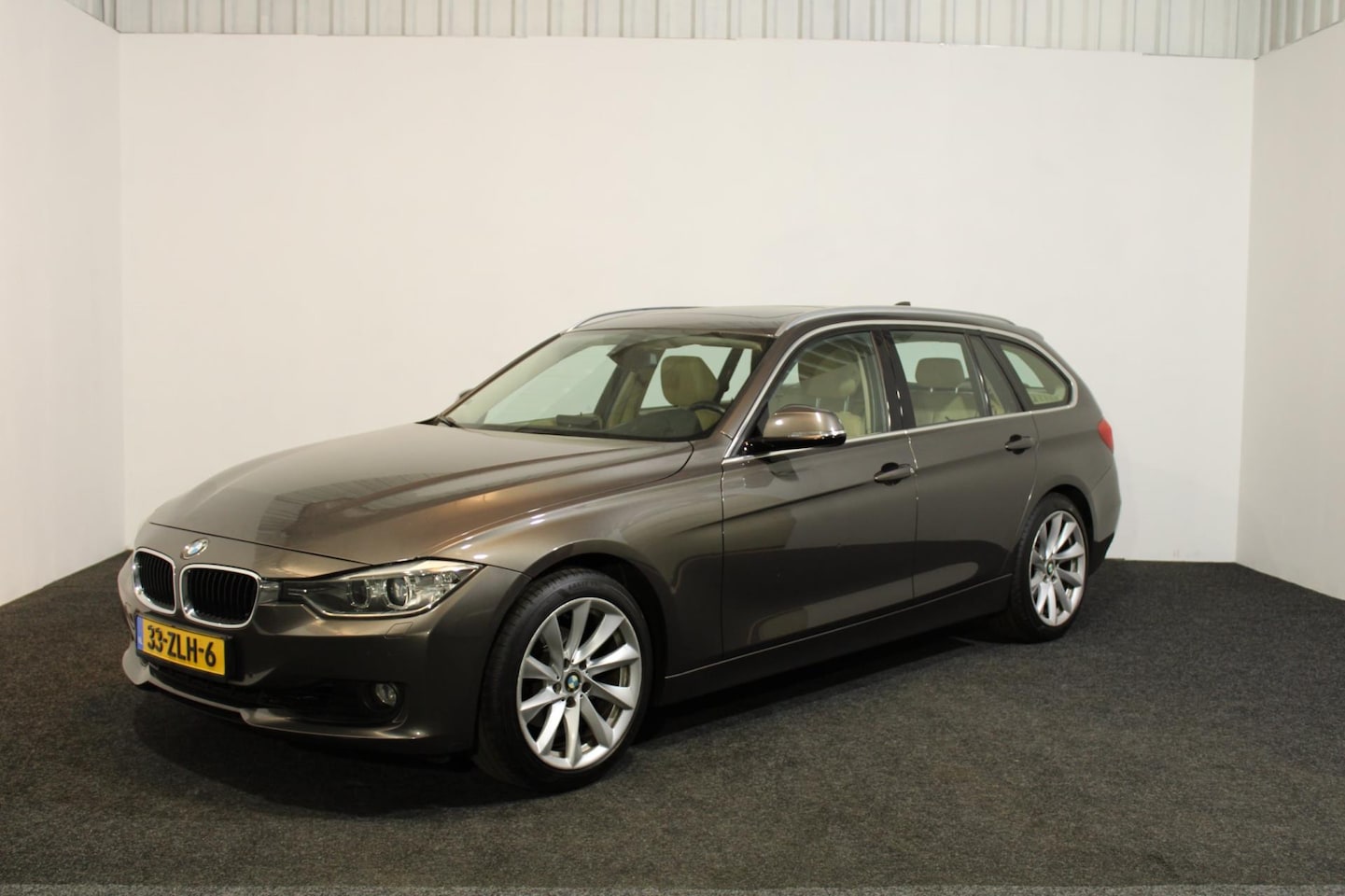 BMW 3-serie Touring - 320i High Executive automaat panoramadak elektrische trekhaak kortom vol in opties! - AutoWereld.nl