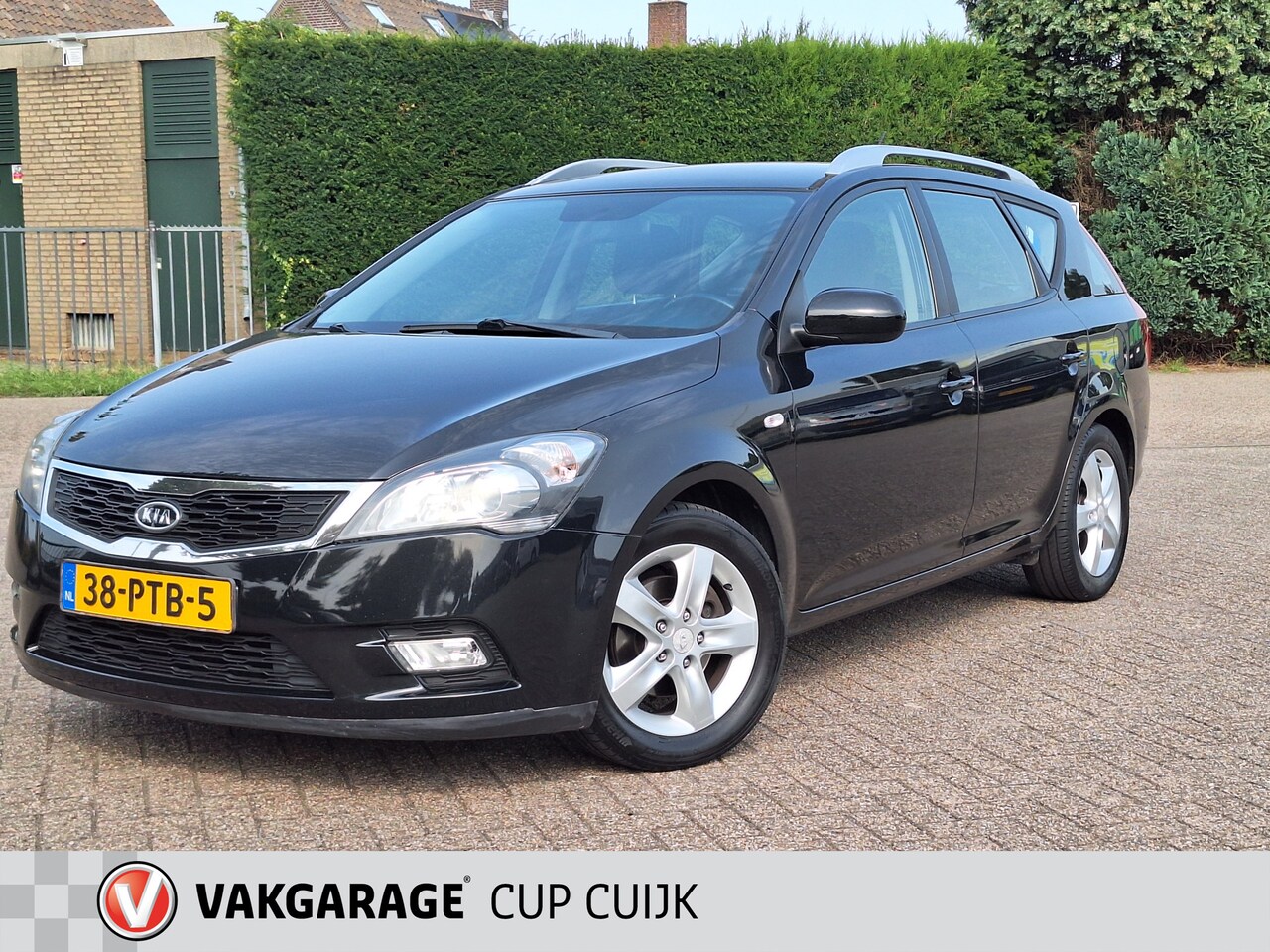 Kia Cee'd Sporty Wagon - 1.4 CVVT Seven Navigatie / Airco / Cruise Controle / Parkeersensoren - AutoWereld.nl