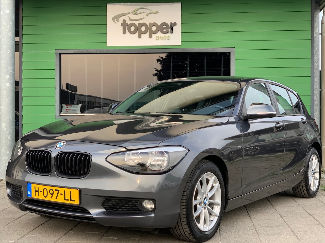 BMW 1-serie - 116i High Executive | Navigatie | CruiseControl | - AutoWereld.nl