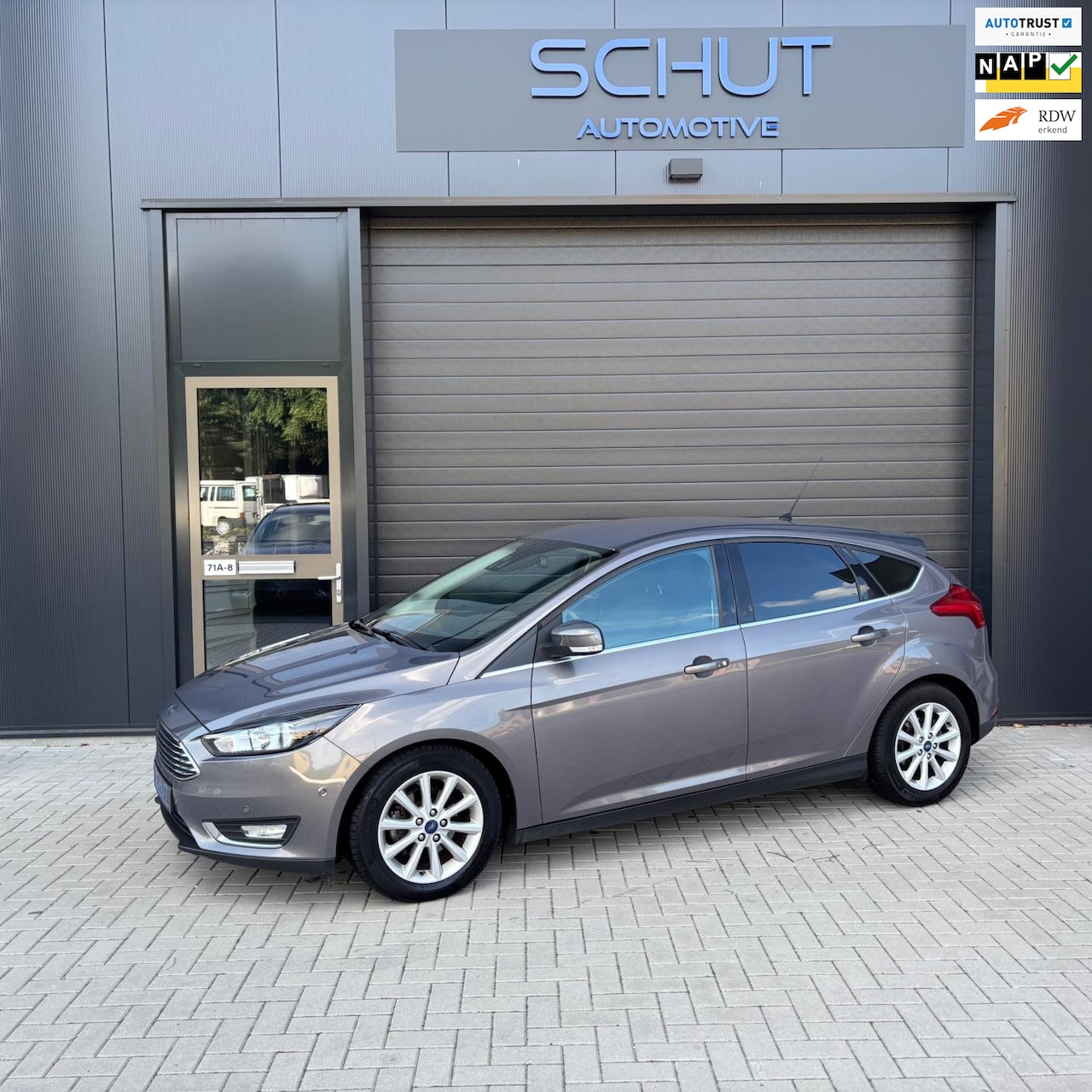 Ford Focus - 125pk Titanium CAMERA | CLIMA | NAVI | STUURVERWARMING | APP | STOELVERWARMING | PDC - AutoWereld.nl