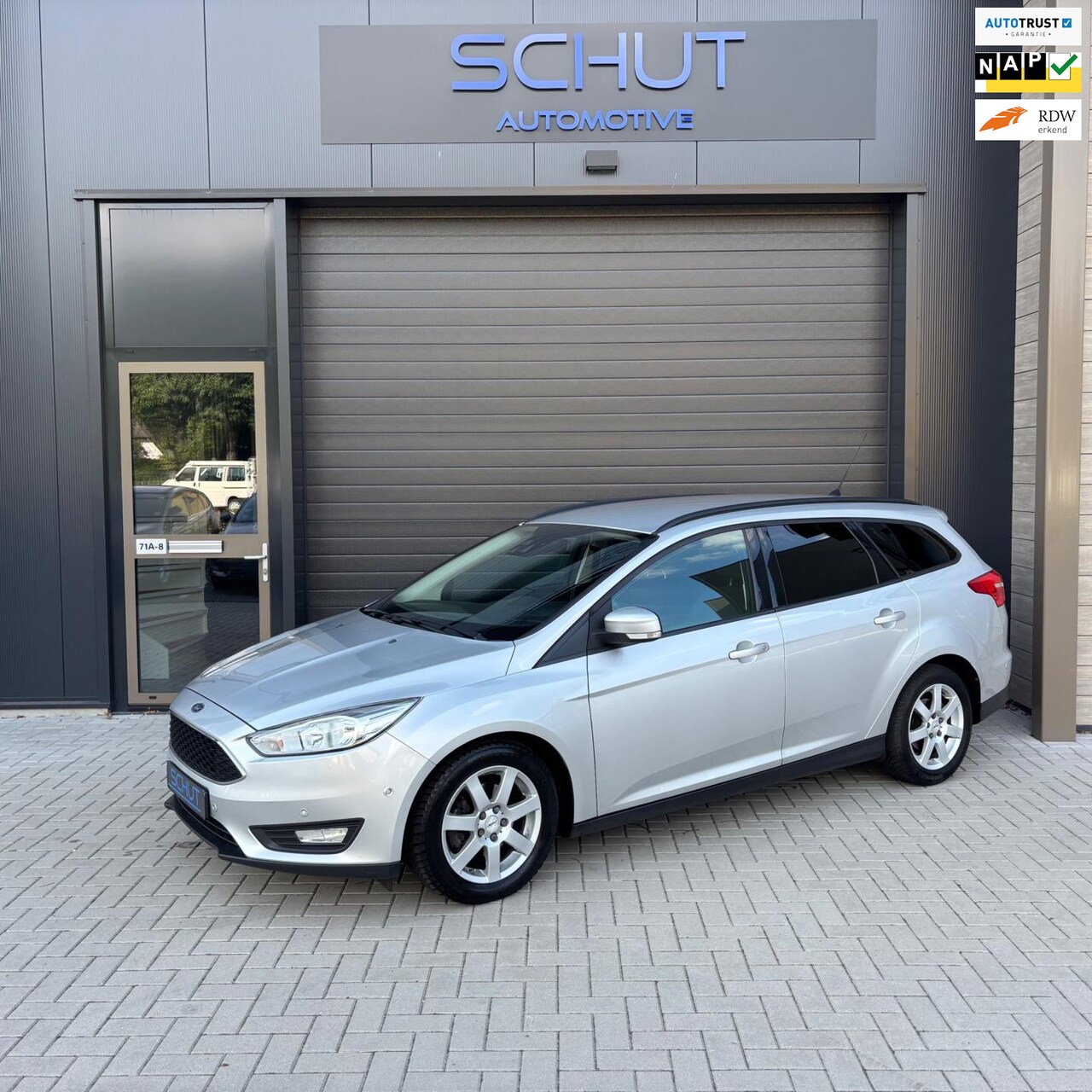 Ford Focus Wagon - 125pk Titanium CLIMA | NAVI | STUURVERWARMING | STOELVERWARMING | PDC | APP - AutoWereld.nl