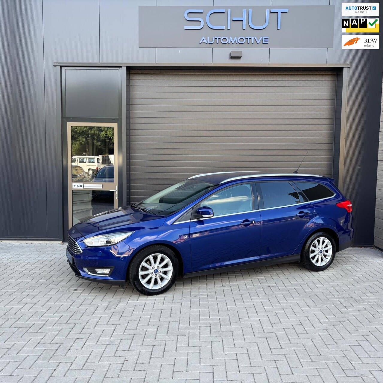 Ford Focus Wagon - 125pk Titanium XENON | HALF LEDER | APP | CLIMA | NAVI | STOELVERWARMING | STUURVERWARMING - AutoWereld.nl