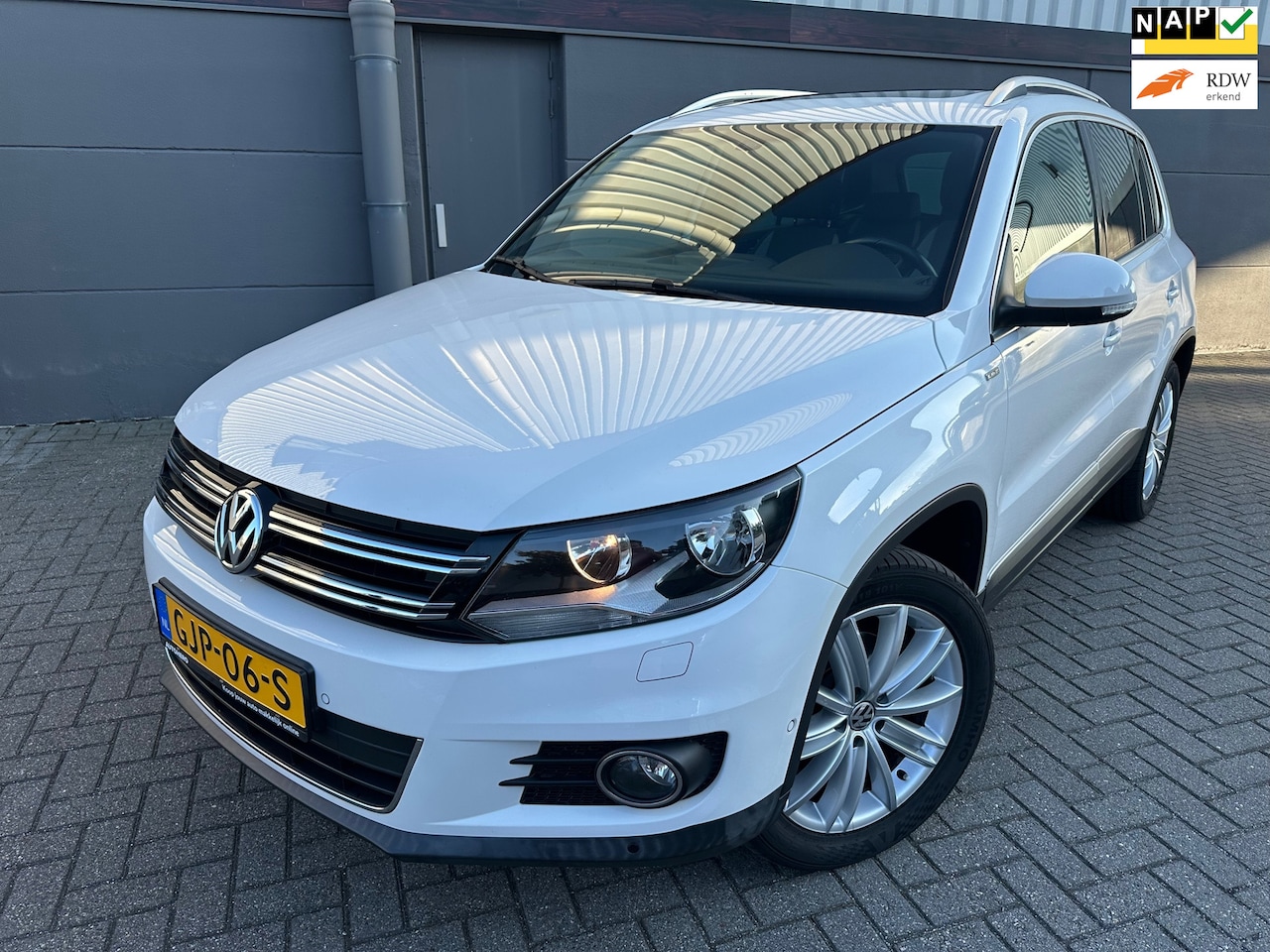 Volkswagen Tiguan - 1.4 TSI Comfort&Design*PANORAMADAK*AIRCO*APK*NAP*PARK SENSOREN - AutoWereld.nl