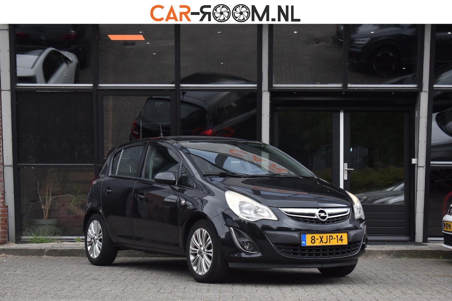 Opel Corsa - 1.4-16V Cosmo Cruise Navi 5DRS NAP - AutoWereld.nl