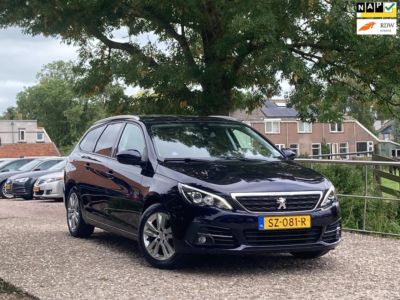 Peugeot 308 SW - 1.2 PureTech Blue Lease Executive | Pano + Cruise + Clima + Navi nu € 8.975,-!!! - AutoWereld.nl