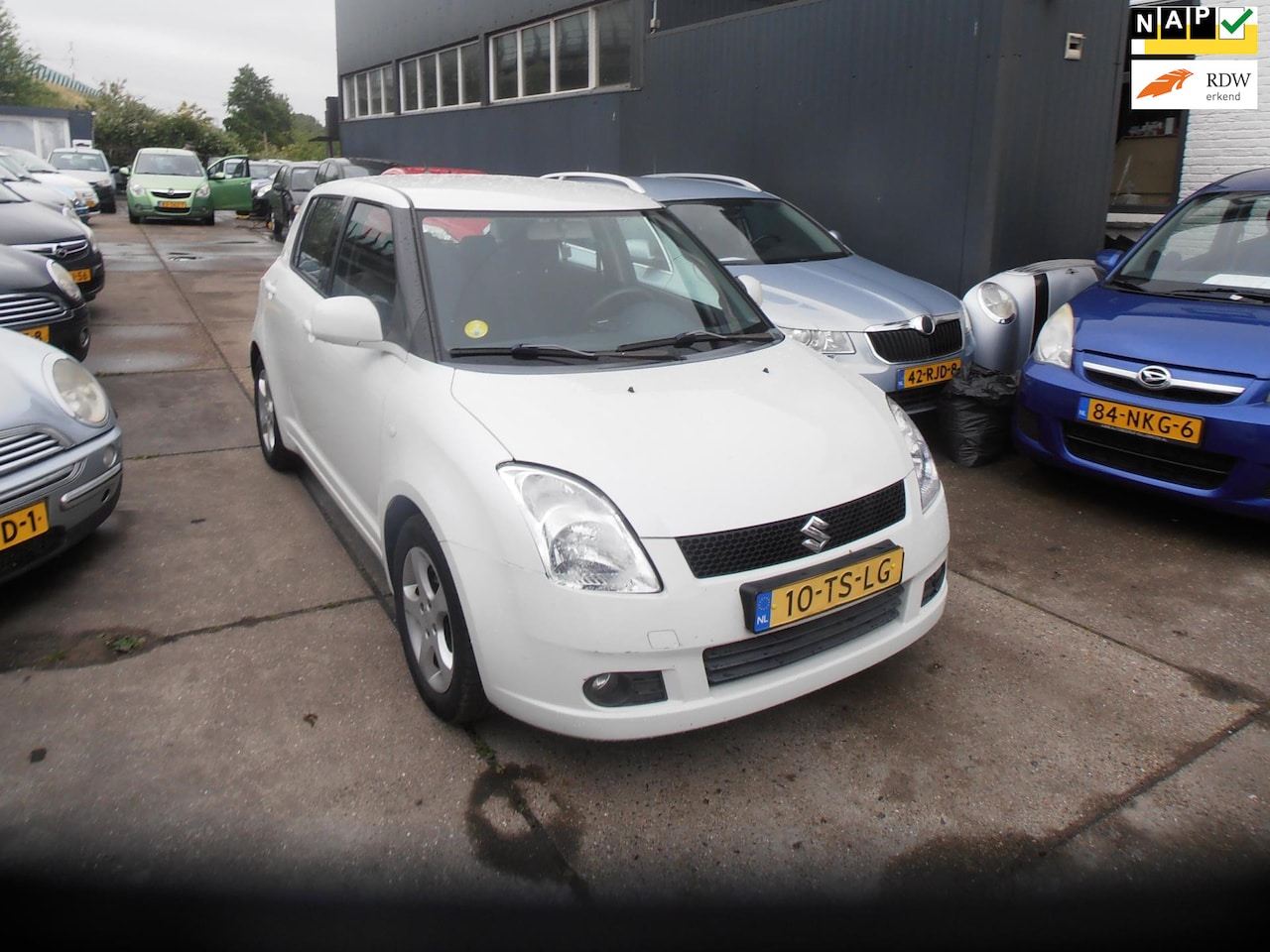 Suzuki Swift - 1.3 Shogun 5 drs airco elek pak nap apk - AutoWereld.nl