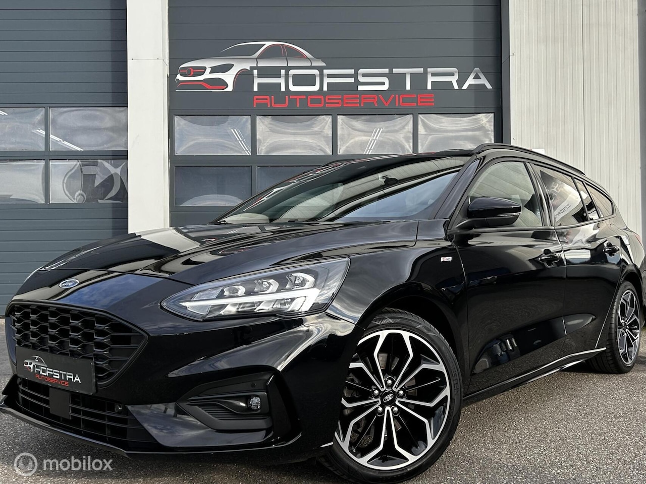 Ford Focus Wagon - 1.0 EcoBoost ST Line Navi Winterpack 18inch - AutoWereld.nl