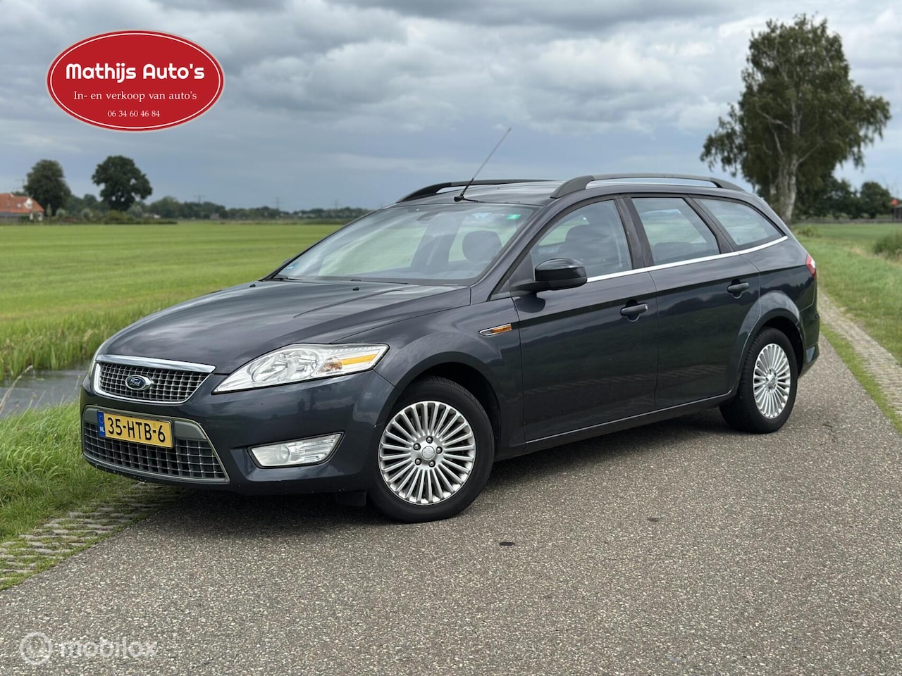 Ford Mondeo Wagon - 2.0-16V Ghia 2.0-16V Ghia - AutoWereld.nl