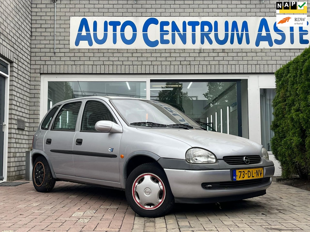 Opel Corsa - 1.2i-16V Strada EERSTE EIGENAAR - AutoWereld.nl