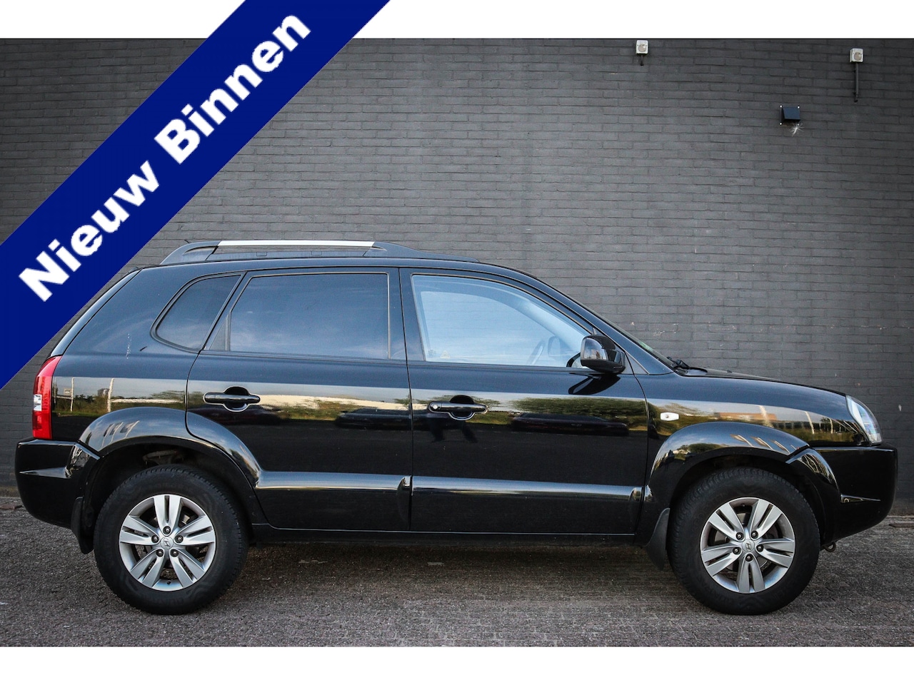 Hyundai Tucson - 2.0i Style Executive Net binnen; Jouw droomauto? - AutoWereld.nl