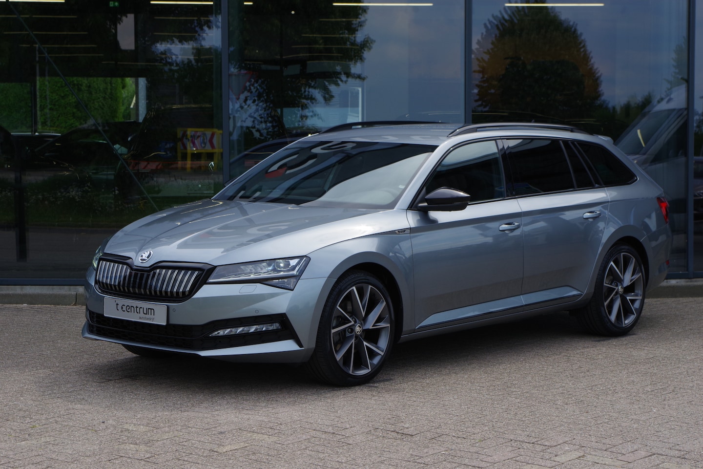 Skoda Superb Combi - 1.4 TSI 218 PK iV Sportline Business PHEV, Adap. Cruise Control, Canton Sound, LED - AutoWereld.nl