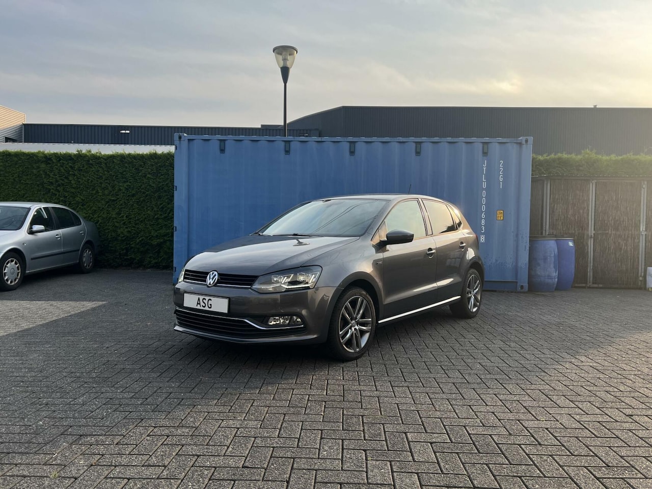 Volkswagen Polo - 1.2 TSI Lounge |Apple Carplay|park sensor|stoelverwarming | - AutoWereld.nl