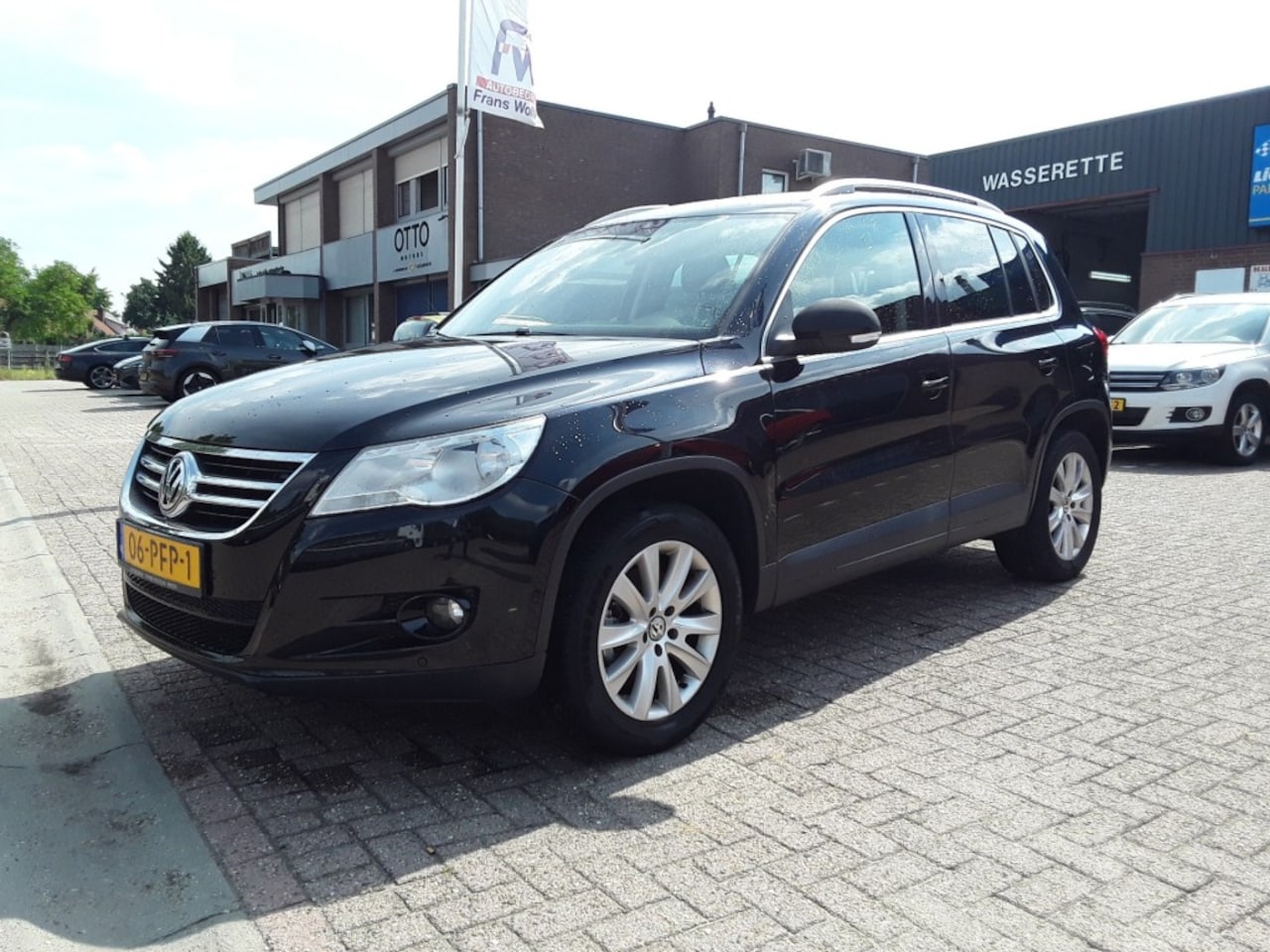 Volkswagen Tiguan - 1.4 TSI Sport&Style 1.4 TSI SPORTenSTYLE / 150 PK - AutoWereld.nl