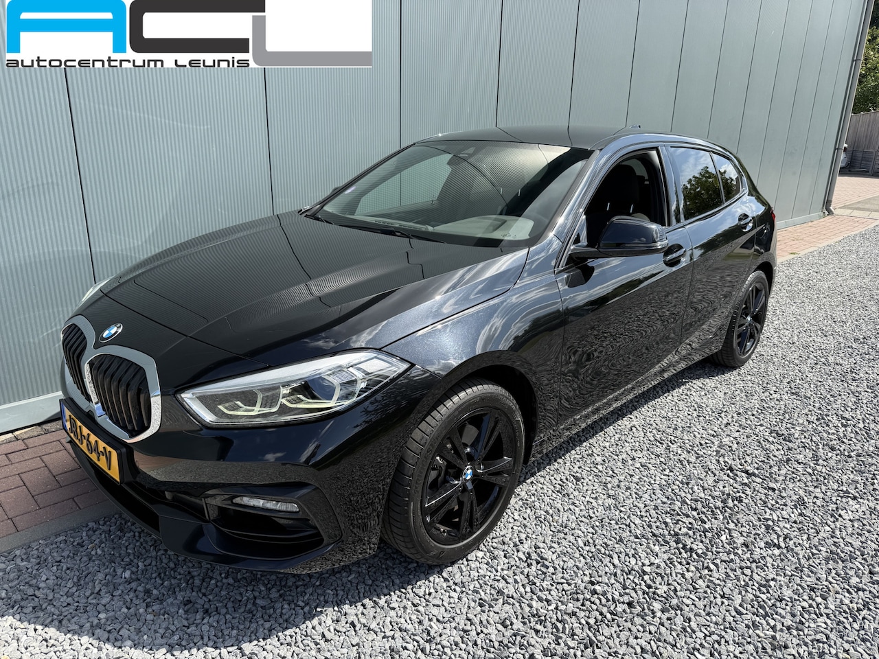 BMW 1-serie - 118i Automaat High Executive Sportline 5-drs - AutoWereld.nl