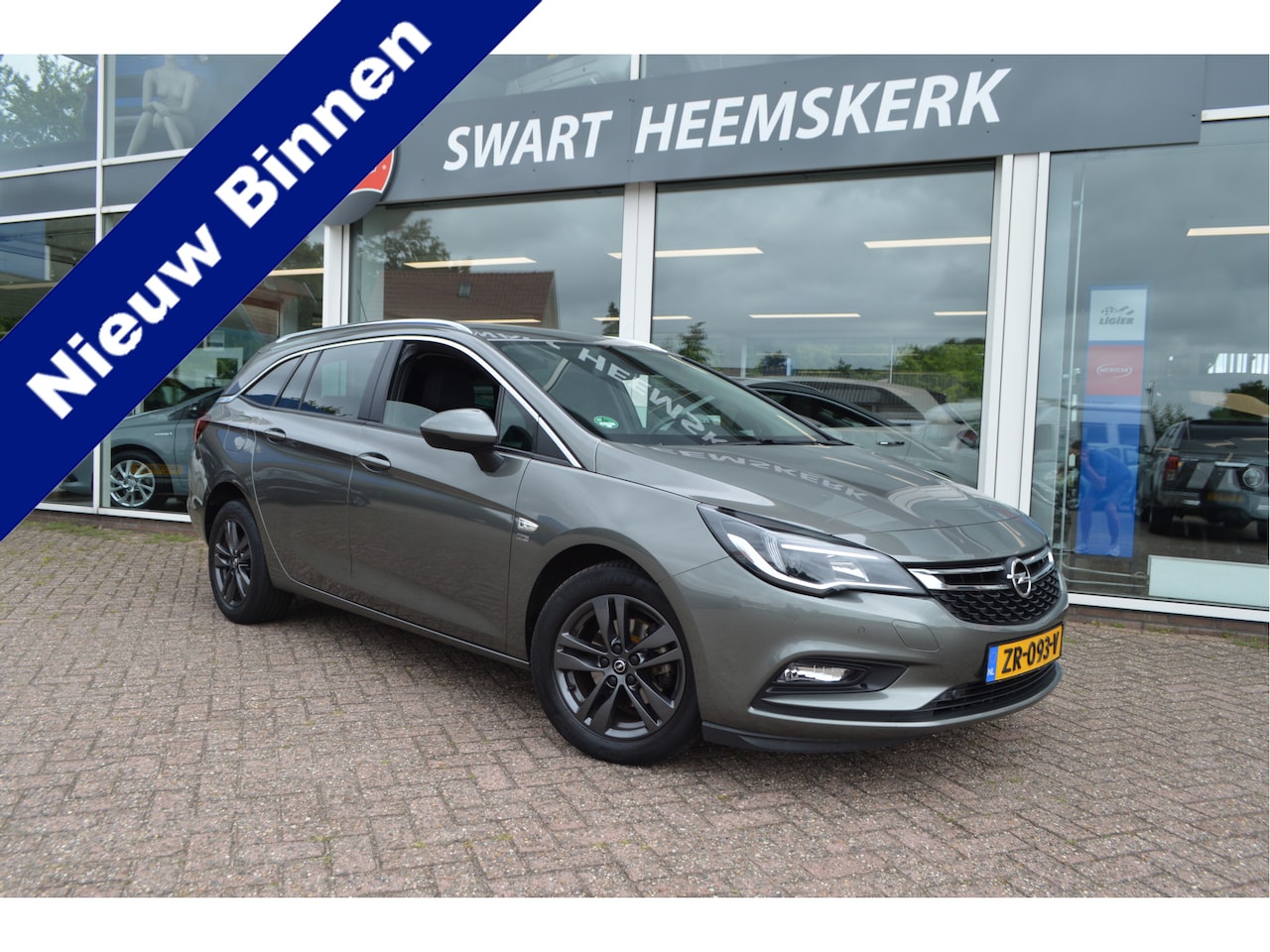 Opel Astra Sports Tourer - 1.0 Turbo 120 Jaar Edition 1.0 Turbo 120 Jaar Edition - AutoWereld.nl
