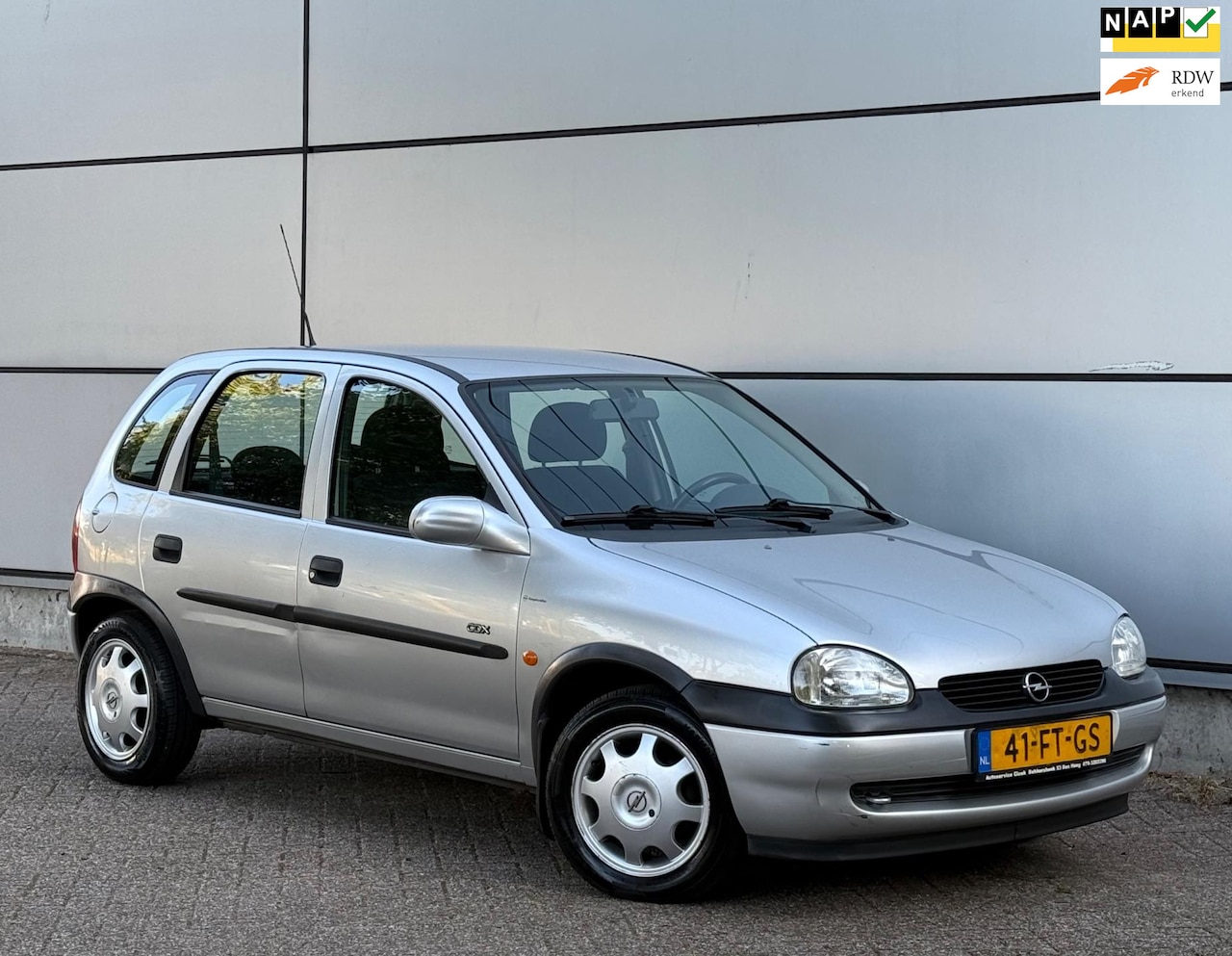 Opel Corsa - 1.4i-16V CDX Automaat |59.500 km |Nap |Airco |Nette Auto |New Apk |Boekjes - AutoWereld.nl