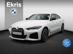 BMW i4 - eDrive35 M Sportpakket Pro | Achteruitrijcamera | Extra Getint Glas Achter | Parking Assis