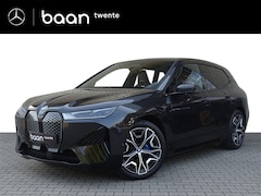 BMW iX - xDrive40 High Executive 77 kWh l Head-up l Comfort stoelen l M sportpakket l Warmte pakket