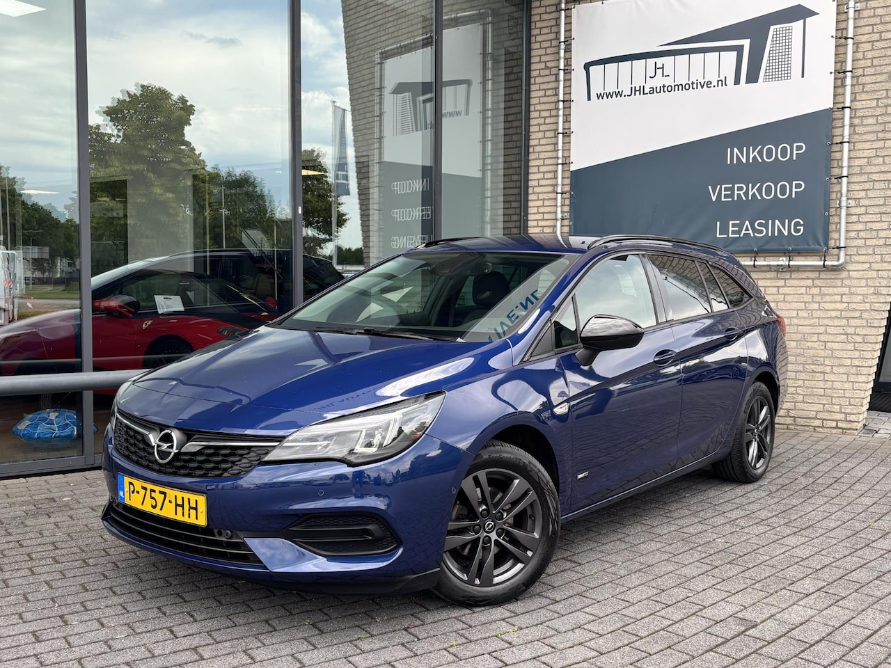 Opel Astra Sports Tourer - 1.2 Design & Tech*NAVI*ECC*CRUISE*HAAK*CAMERA*TEL* - AutoWereld.nl