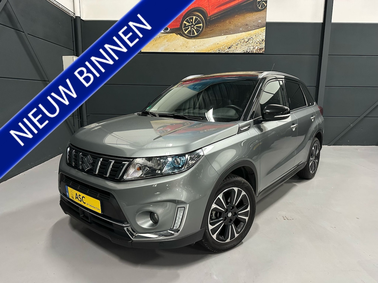 Suzuki Vitara - 1.4 Boosterjet 140pk Stijl (Automaat) Leder Navigatie Camera Panoramadak Xenon - AutoWereld.nl
