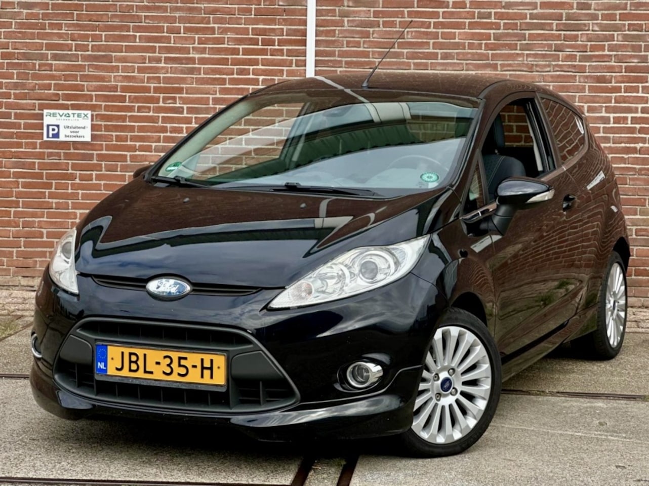 Ford Fiesta - 1.25 Ghia 1.25 Ghia - AutoWereld.nl