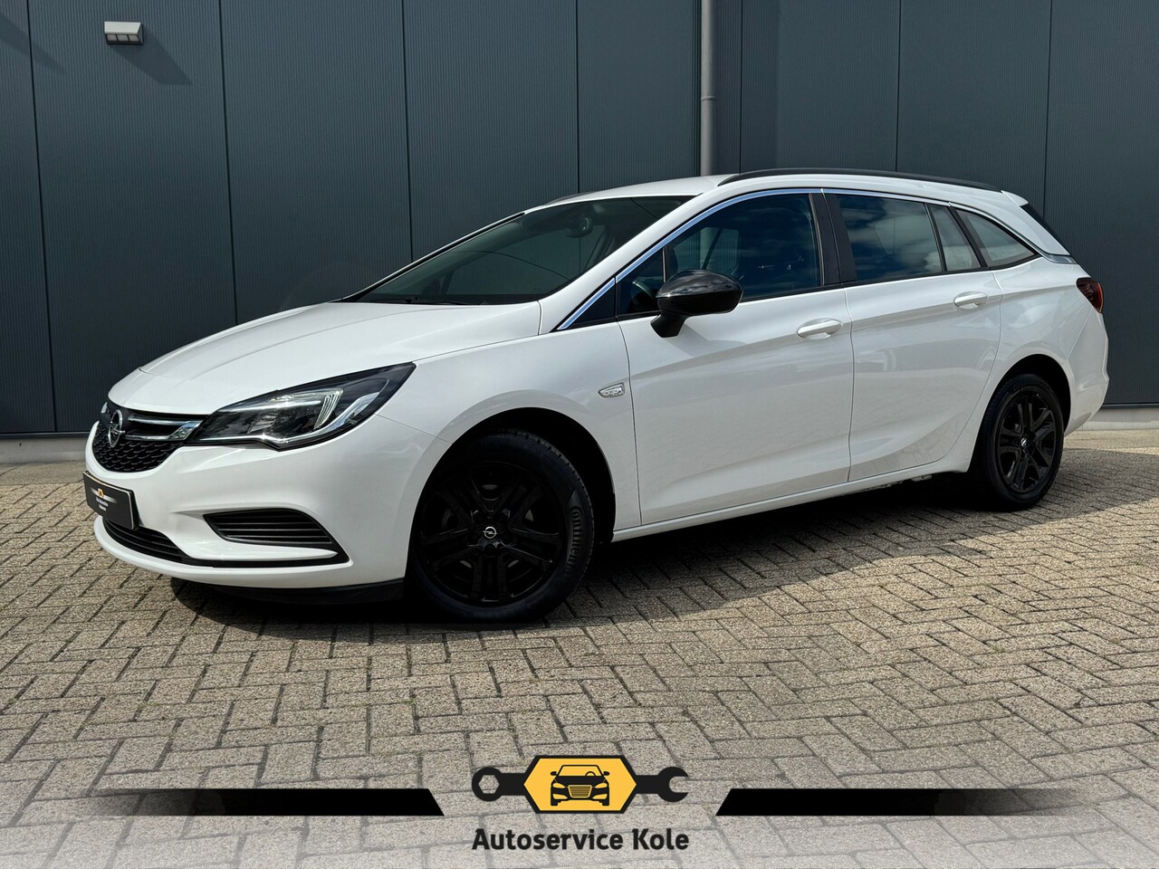 Opel Astra Sports Tourer - 1.0 Turbo Business * Cruise * PDC a * Licht metaal * - AutoWereld.nl