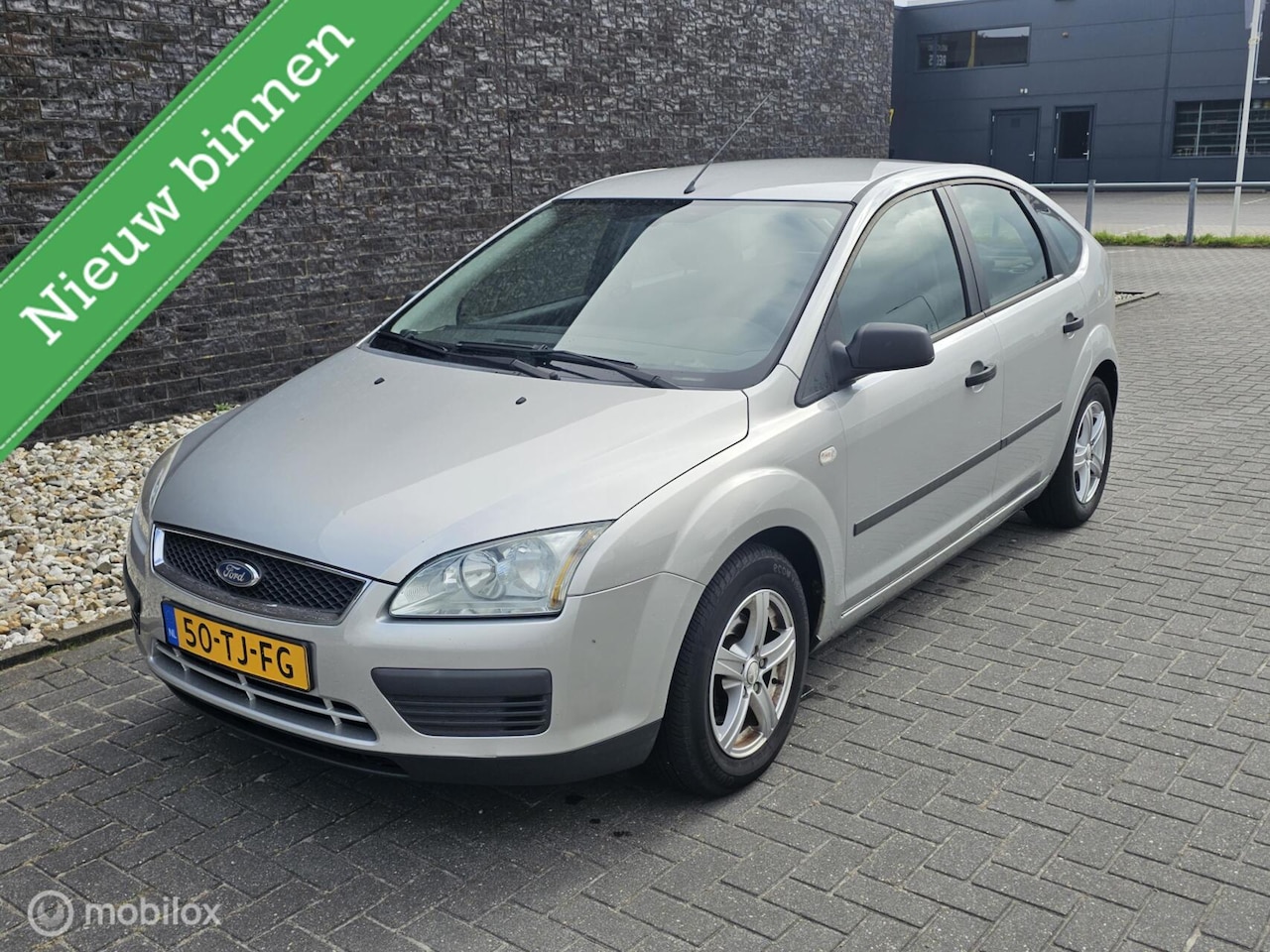 Ford Focus - 1.4-16V Ambiente Airco - Trekhaak - AutoWereld.nl