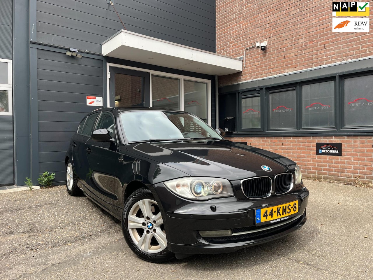 BMW 1-serie - 116i High Executive|Nap|Pdc|Xenon|Navi|Cruise|Apk - AutoWereld.nl