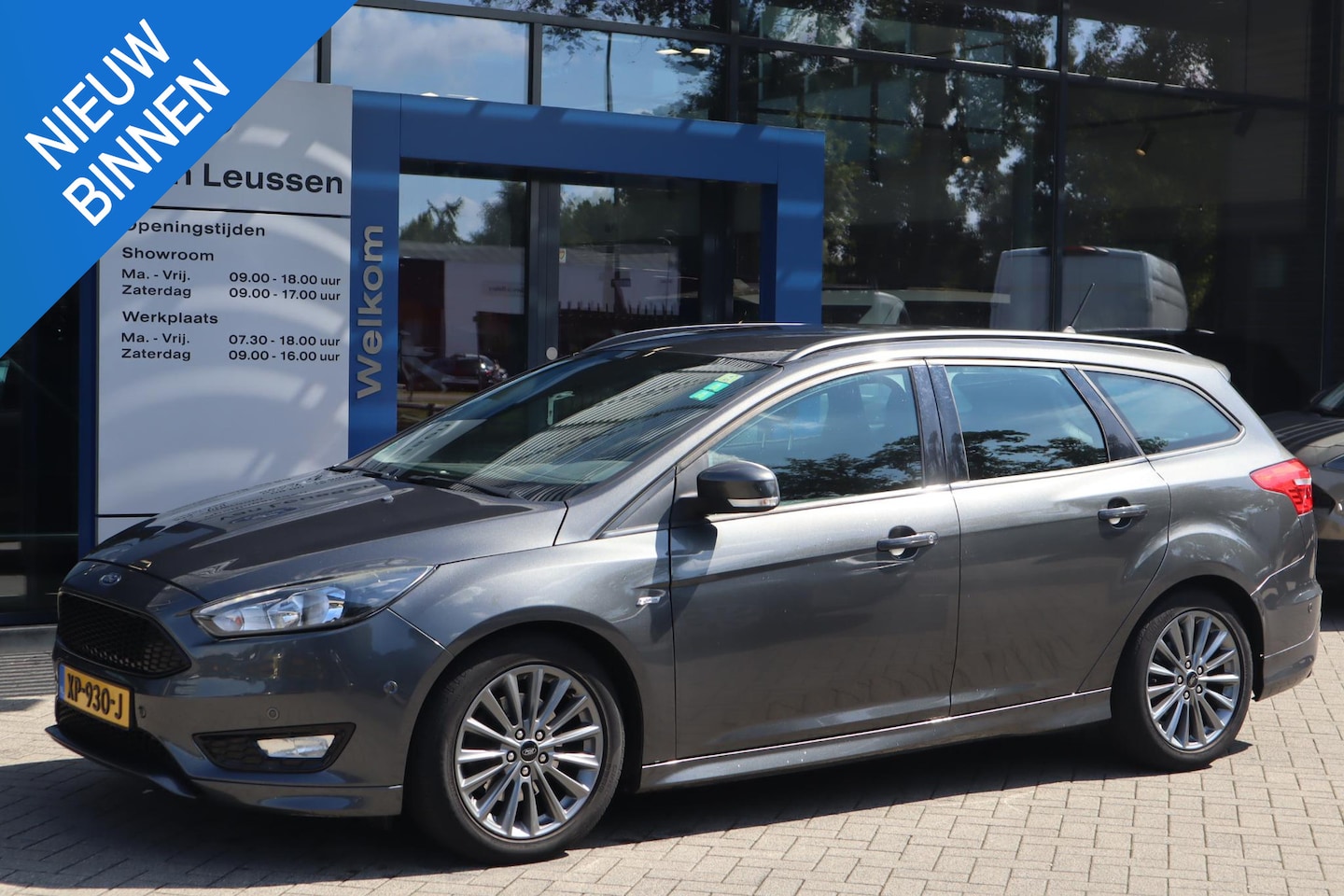 Ford Focus Wagon - 1.5 ST-LINE TREKHAAK STOEL/VOORRUITVERW. NAVI LM-VELGEN CLIMA P-SENSOREN KEYLESS - AutoWereld.nl
