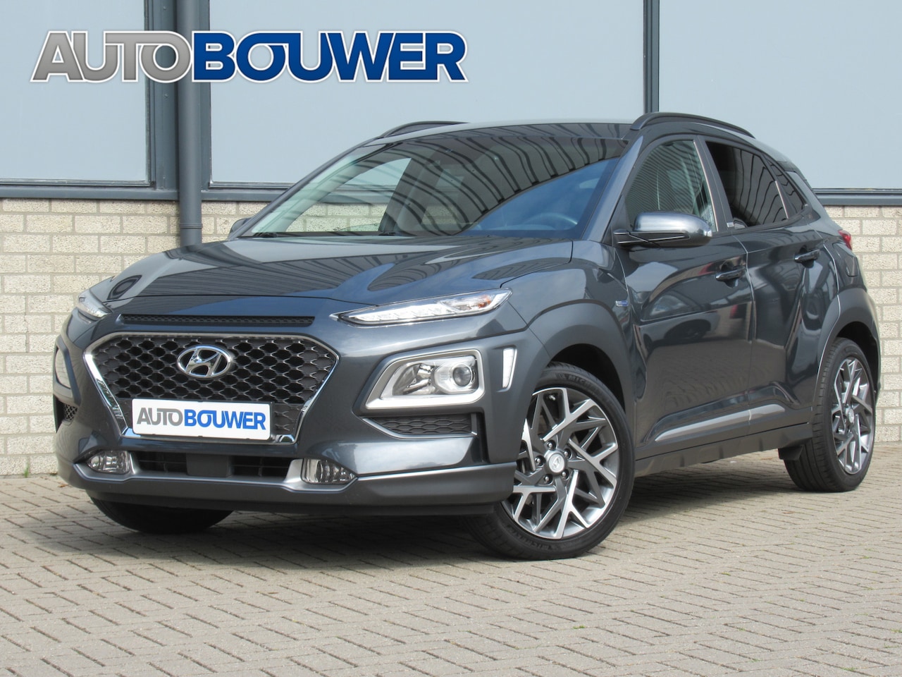 Hyundai Kona - 1.6 GDI HEV Edition 2e eigen | dealer onderh | tr.haak | navi | camera | 18"inch | keyless - AutoWereld.nl