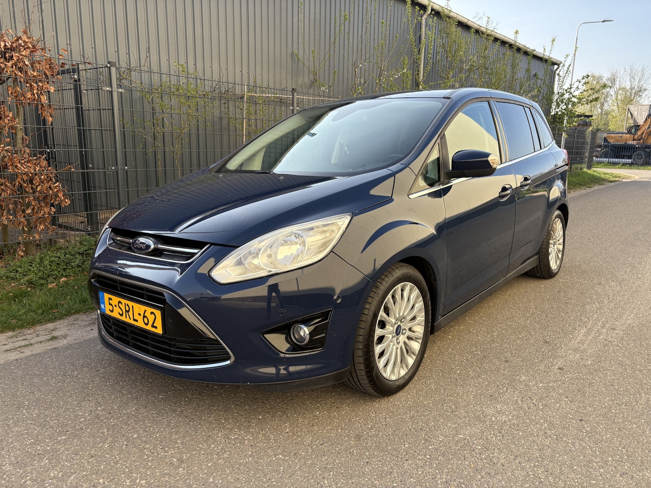 Ford Grand C-Max - 1.0 Titanium / AIRCO / NAVI / 6 PERSOONS - AutoWereld.nl