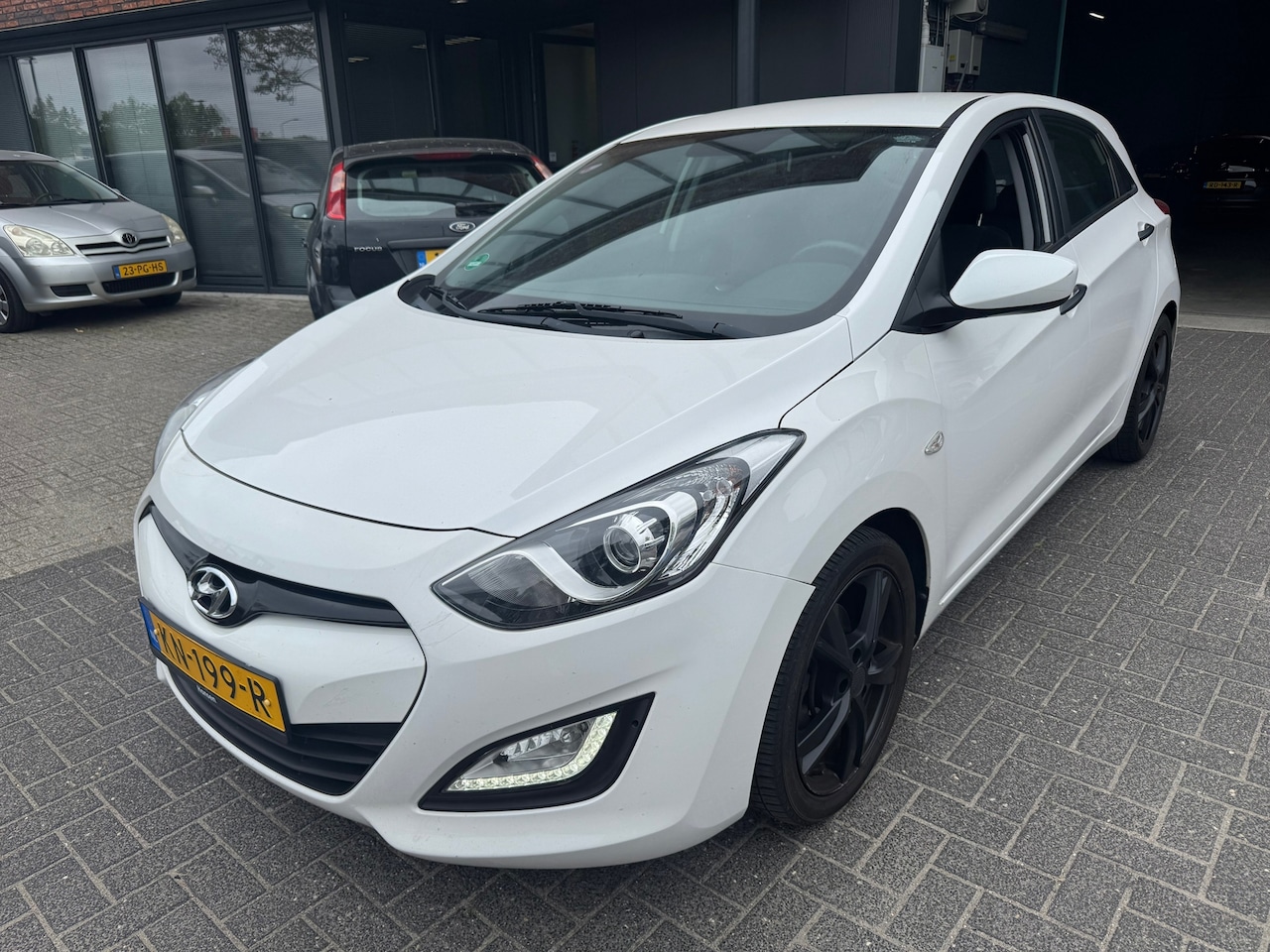 Hyundai i30 - 1.4i i-Drive Cool 5DRS AIRCO SPORTIEF COMPLEET ONDERHOUDEN - AutoWereld.nl