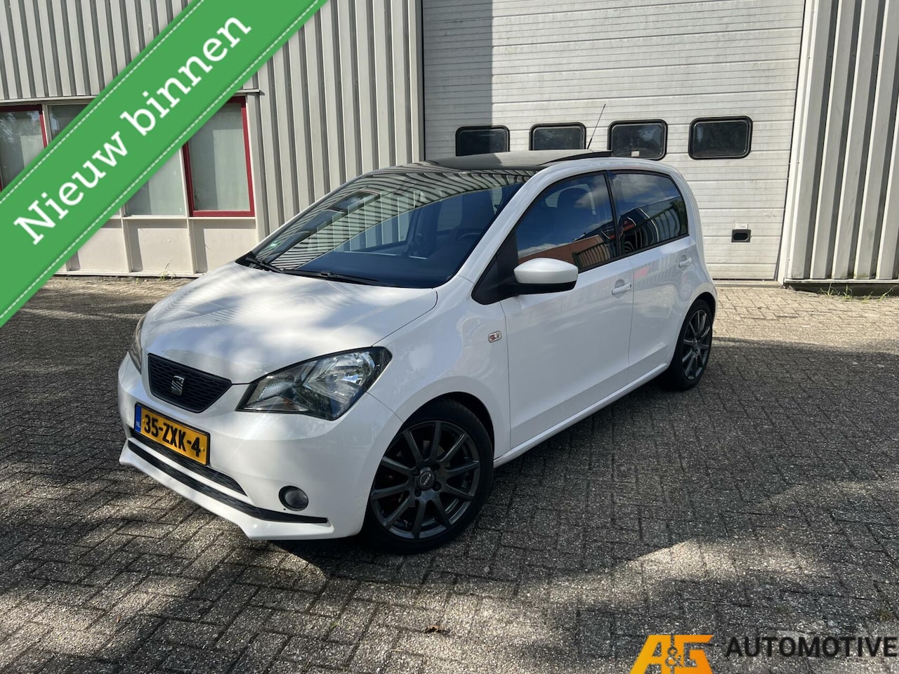 SEAT Mii - 1.0 5DRS Style Sport 2013 | Pano | Cruise | PDC | - AutoWereld.nl