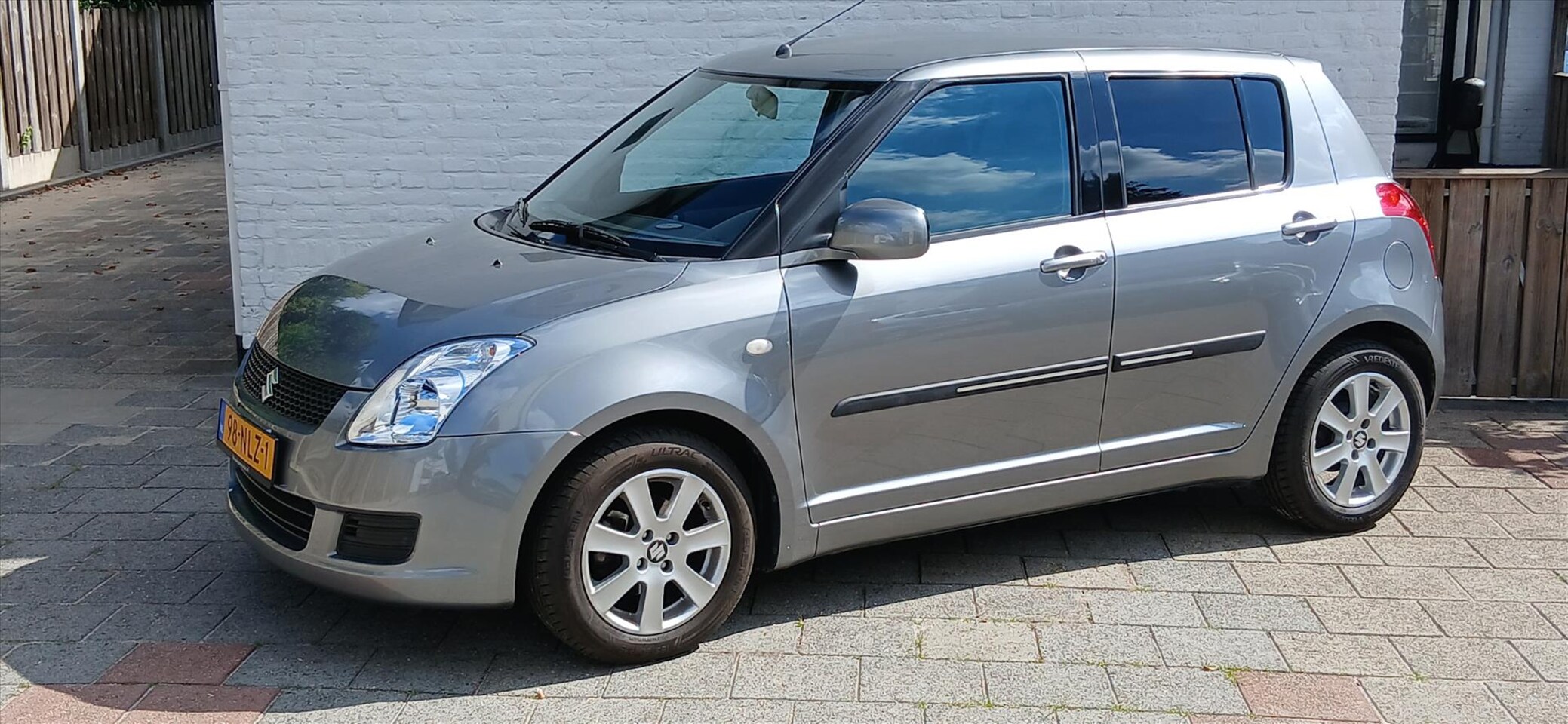 Suzuki Swift - 1.3 5D Xpression airco 58000 km - AutoWereld.nl
