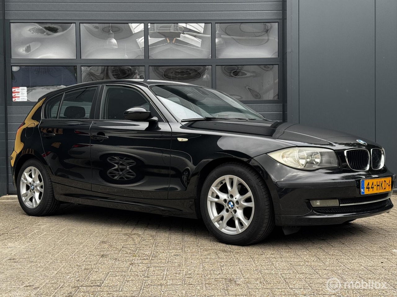 BMW 1-serie - 116i Business Line 116i Business Line, Airco, navi, - AutoWereld.nl