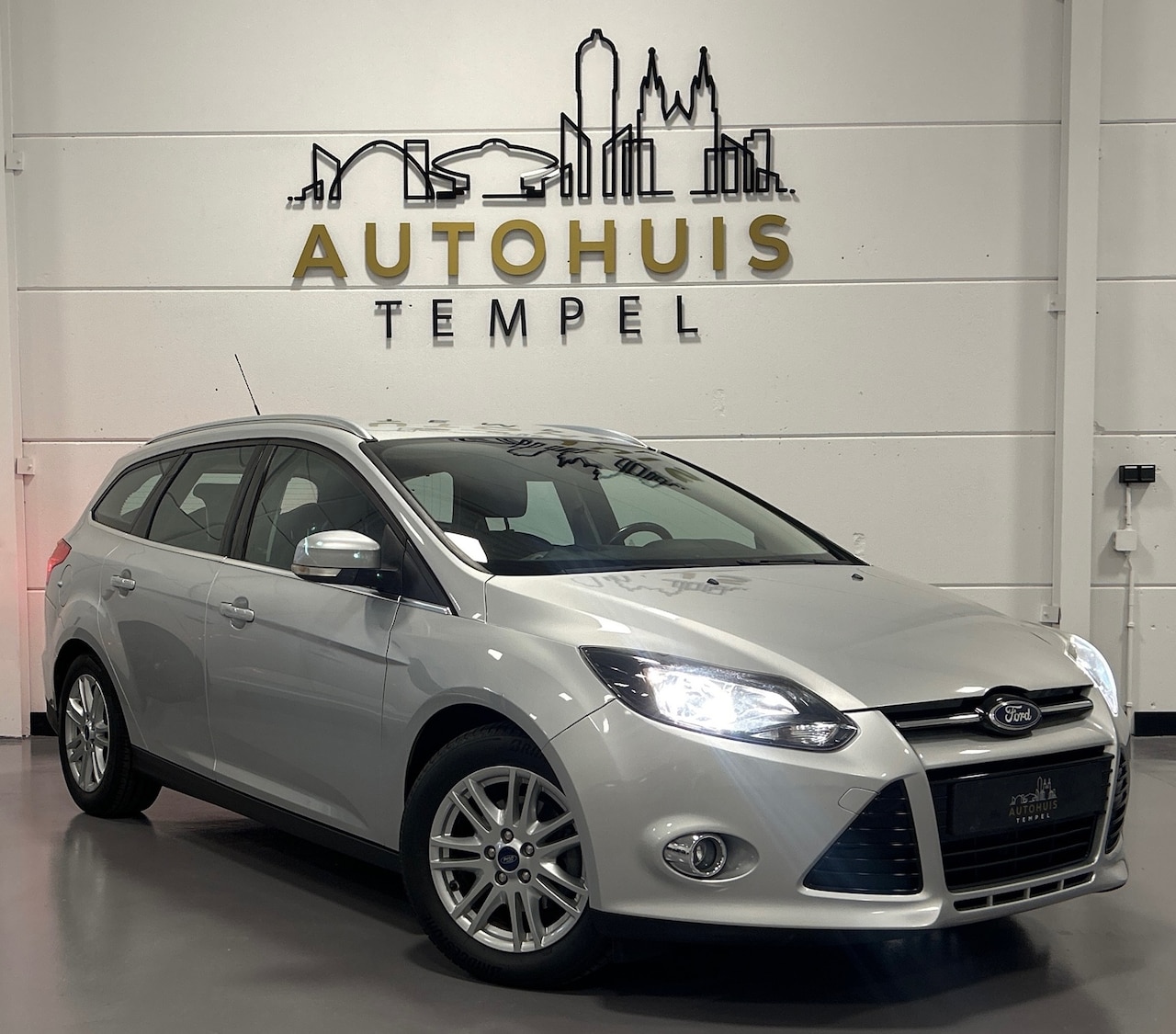 Ford Focus Wagon - 1.0 EcoBoost Titanium Nap Airco Parkeersensoren Start/Stop 2e Eigenaar - AutoWereld.nl