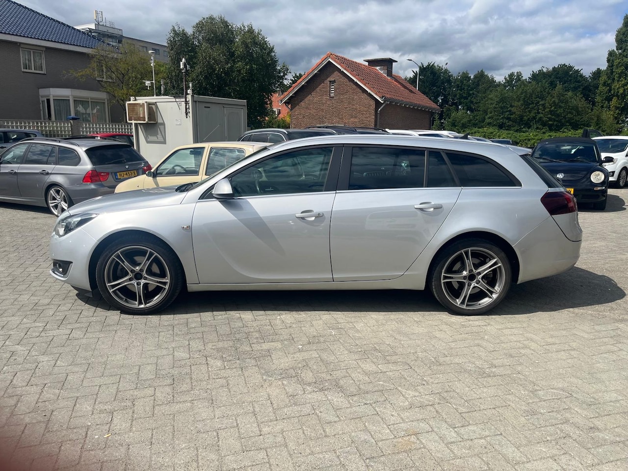 Opel Insignia Sports Tourer - 1.6 T Business+ leer navi lm velgen - AutoWereld.nl