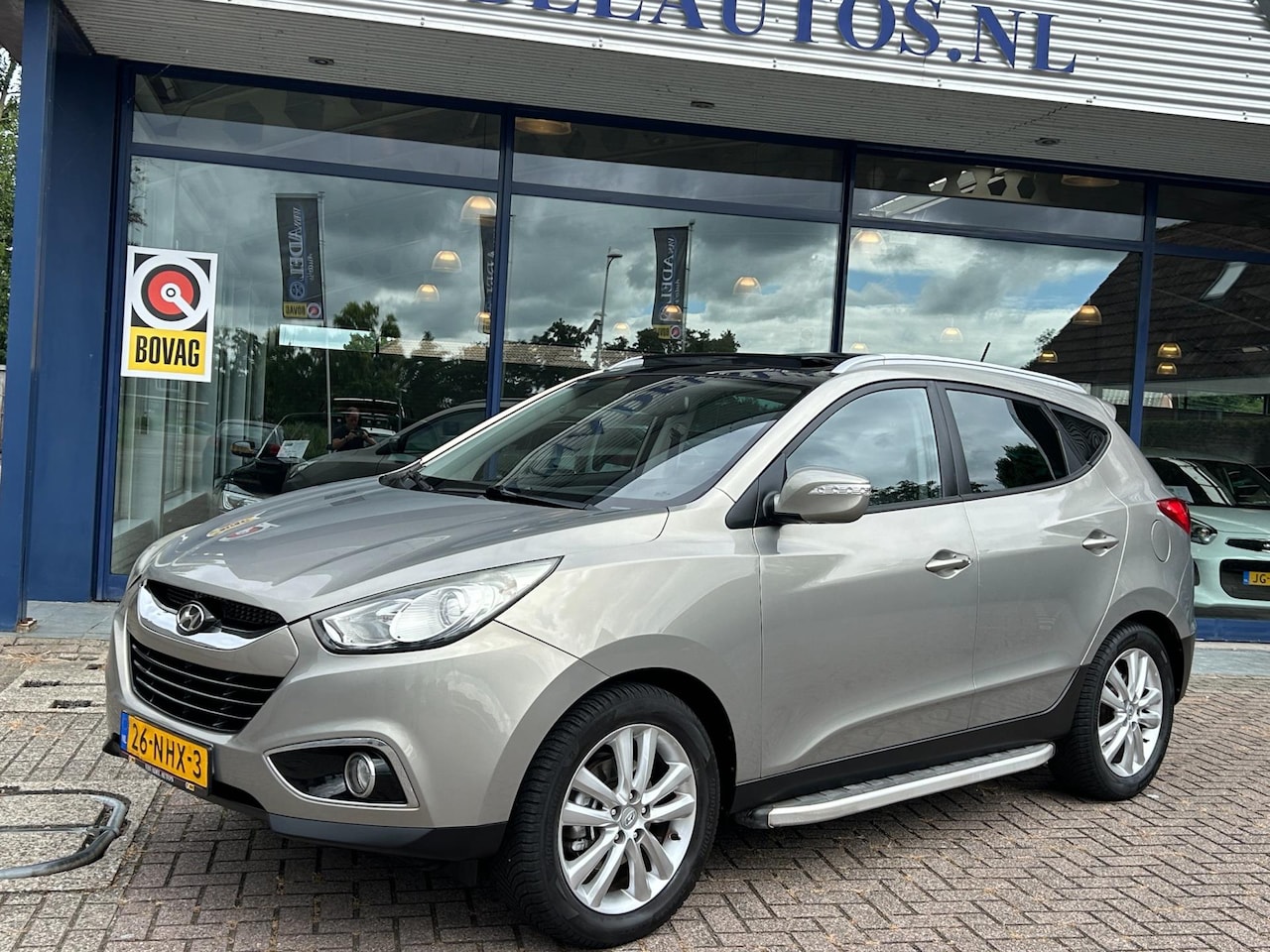 Hyundai ix35 - 2.0i i-Catcher Aut. Pano/Schuif Leer Navi Camera Trekhaak NAP NL-Auto Dealeronderhouden! - AutoWereld.nl