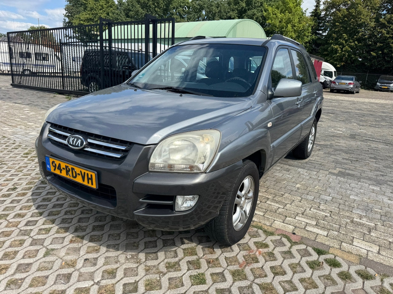 Kia Sportage - 2.0 CVVT Executive 2.0 CVVT Executive - AutoWereld.nl