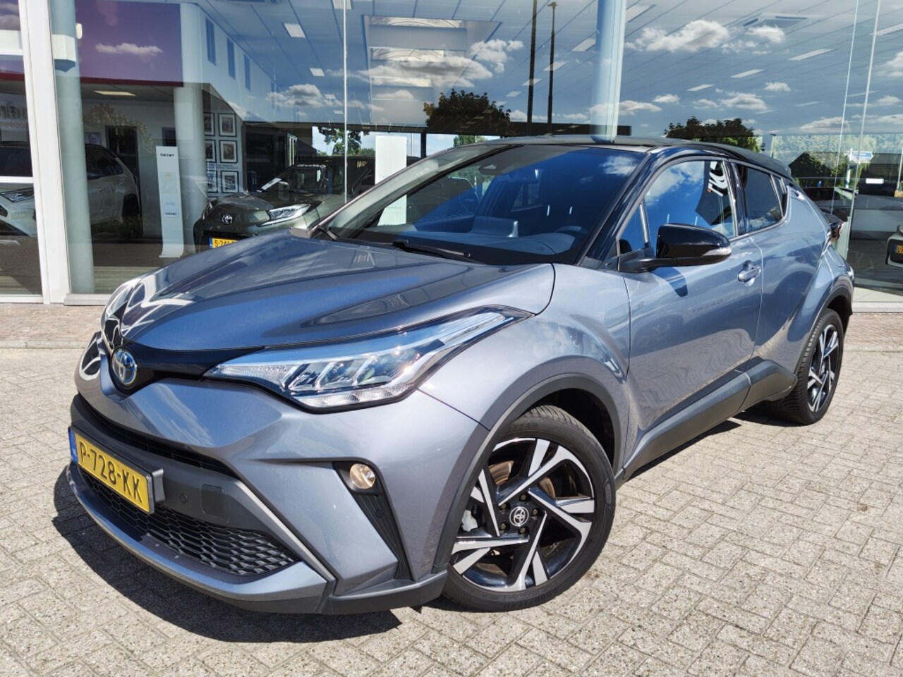 Toyota C-HR - 1.8 Hybrid Business Plus Bi-Tone | Navi | Keyless Entry&Start | - AutoWereld.nl